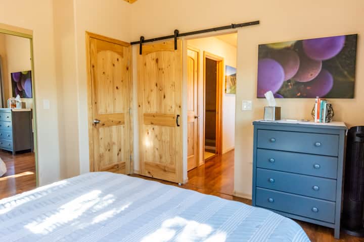 Bedroom view down hallway to bathroom