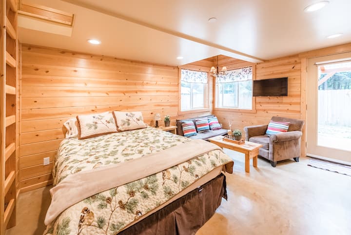 The studio apartment sleeps 3. It features a queen bed, kitchenette and dining area, as well as a 3/4 bath and stacked washer/dryer. Climb the ladder to a bonus loft with a twin bed!