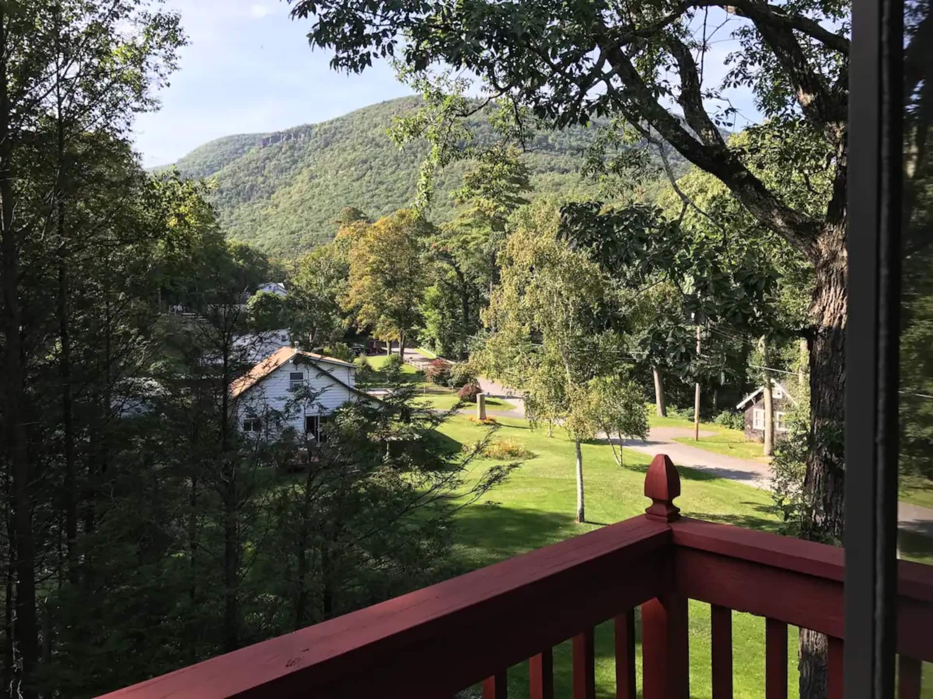 Serenity Retreat exterior view with mountain backdrop