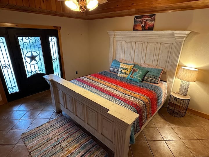 Bedroom one with Texas-size door to room and bathroom making it easy for wheelchair access. 