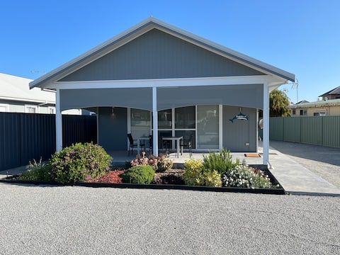 Dolphin Chalet - Street front with view