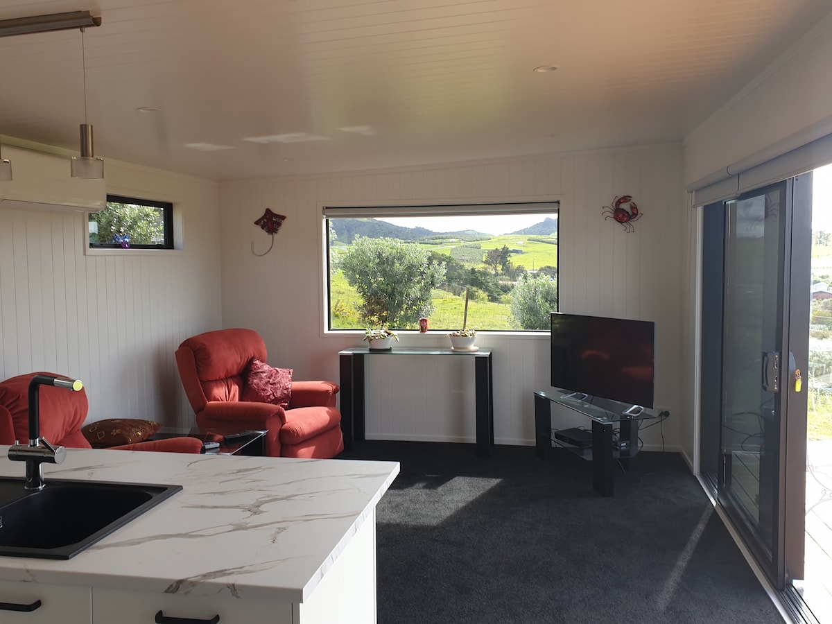 Popular Airbnb listing: Luxury Mangawhai Heads Cabin & 2nd b/rm option in Mangawhai