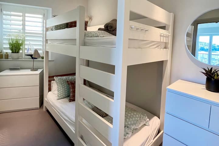 Bunk Room 
This small room, located just off the main living area,  is the perfect space for younger guests.  It has a full sized single bunk bed and two small chest of drawers.