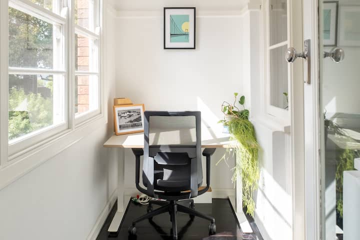Sun-drenched dedicated office space with a view.