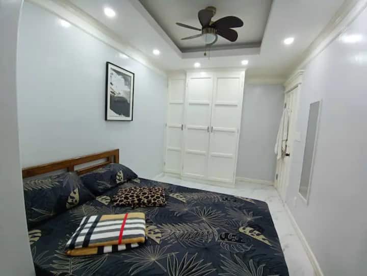 Room #3: 1 queen sized bed, closet,  ceiling fan, and an east facing window