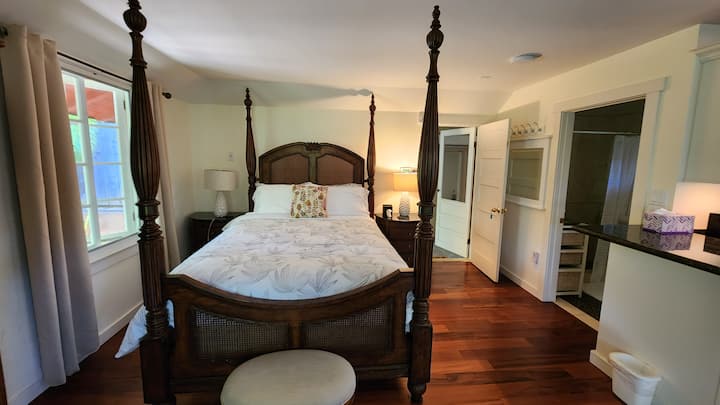 Separate private studio offers a queen-sized bed with Tommy Bahama linens, A/C, ceiling fan, TV with streaming device & DVD player, en suite with shower & kitchenette
