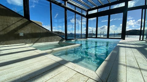 Top Airbnb: Incredible lake view with pool, sauna and gym in San Carlos De Bariloche