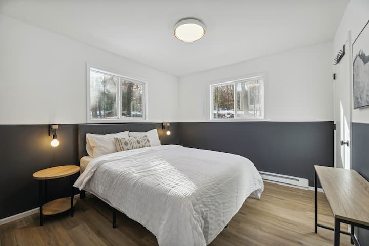 Do you choose the lower level bedroom with queen bed?  You’ll sleep comfy on this new foam mattress.  Bedside sconces and dimmer on the main overhead light help set the mood at night.
