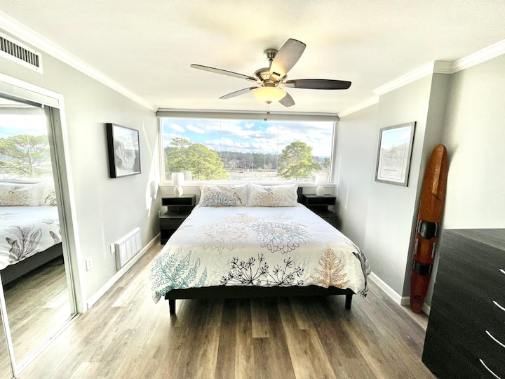 The master bedroom has a very comfy king bed.
