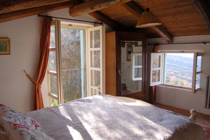 bedroom with views of the countryside and sea view