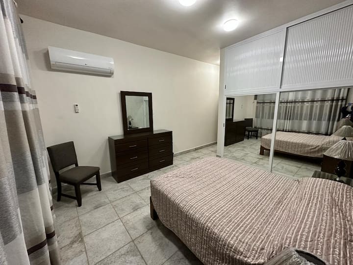 Third bedroom with king size bed and mini split.