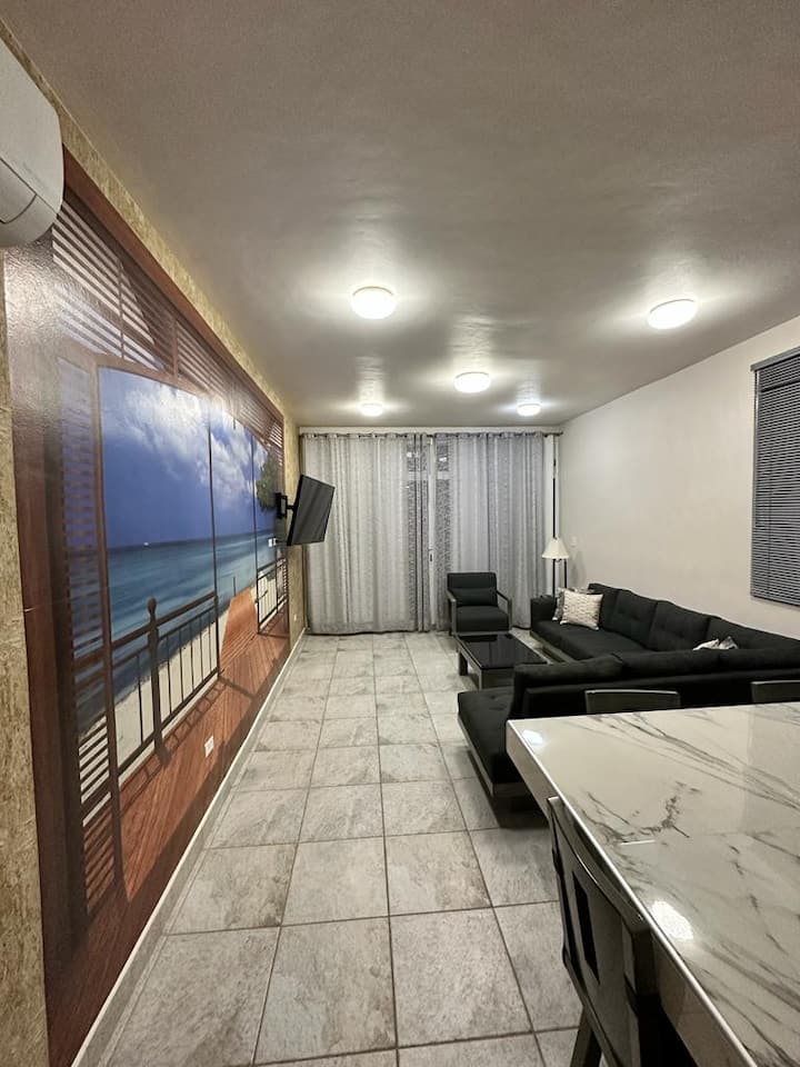 Living room with mini split.