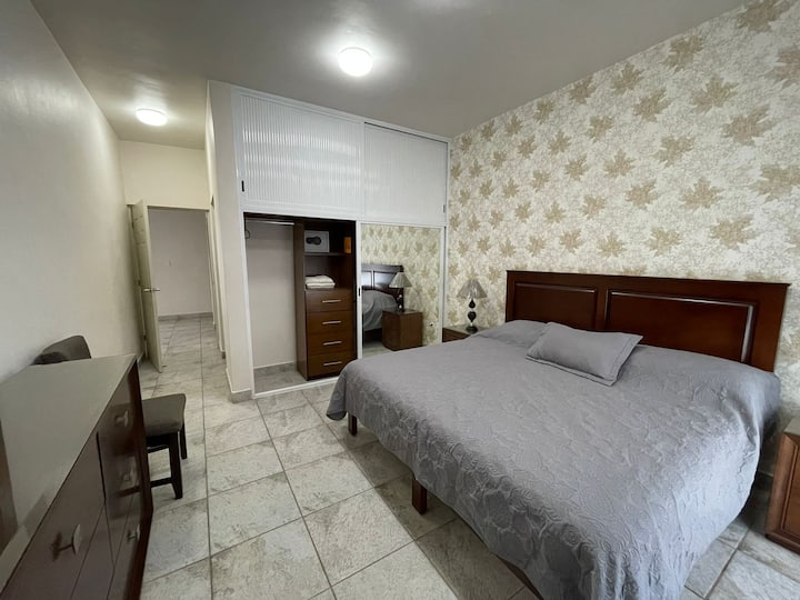 ground floor bedroom with closet