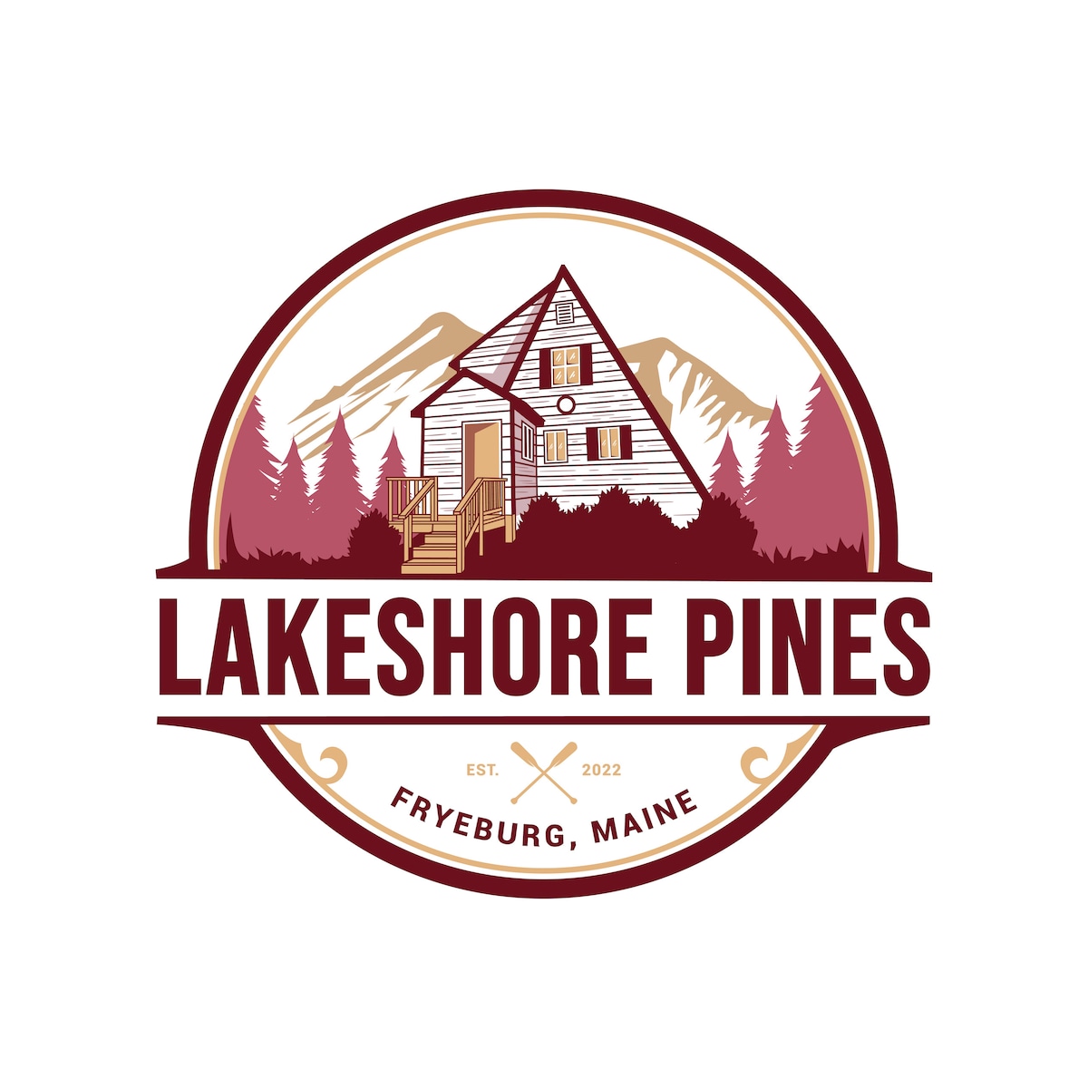 The logo for Lakeshore Pines is circular, featuring an illustration of a modern A-frame cabin surrounded by trees and mountains. The colors are earth-toned with deep reds and greens, and the text displays the name and location, emphasizing the inviting nature of the property.