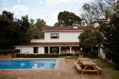 House at the foot of the hill