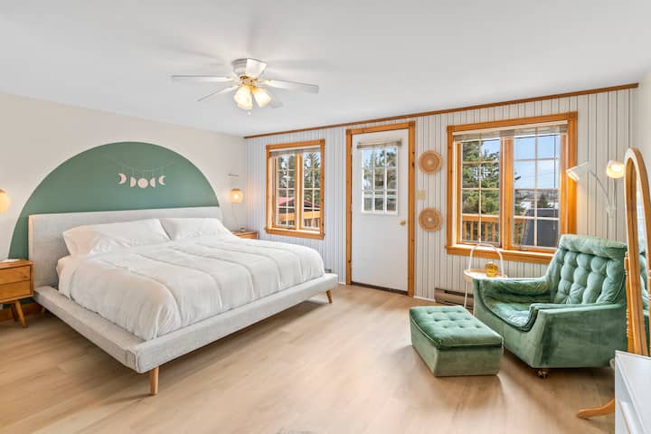 Also on the second floor, this tranquil space is The Zen Room which features a walk-out deck overlooking New London Bay, plenty of storage and a seating area.