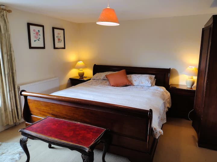 Super-king room with the mother of all comfortable sleigh beds!