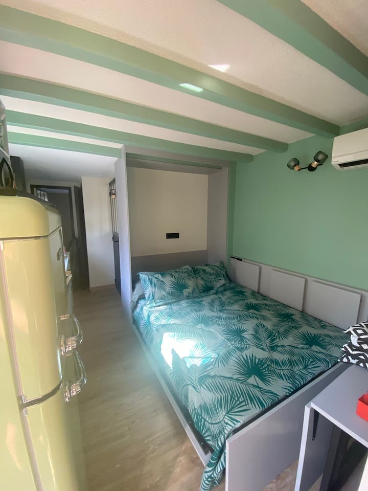 Sala de estar en modo cama 140x200