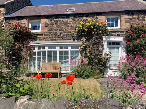 4 bed cottage with parking and views in Craster