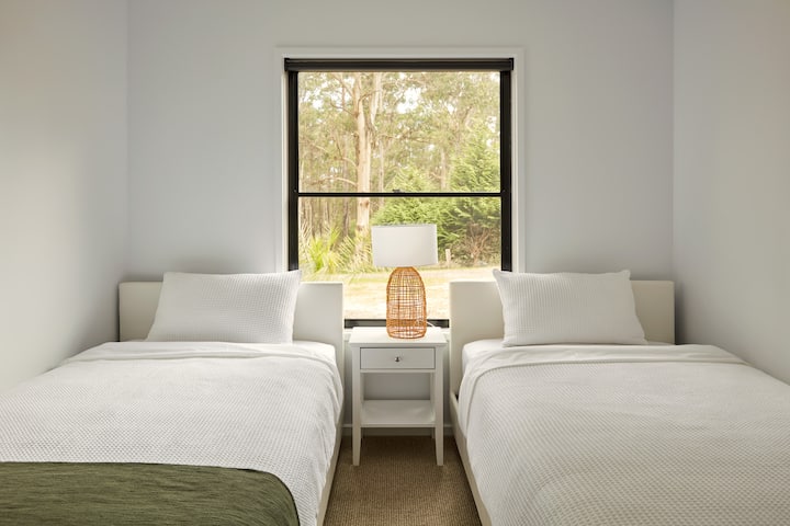Segundo dormitorio con camas individuales tamaño king