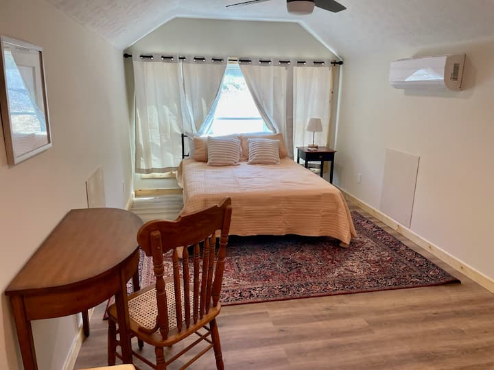 Bedroom 3 on the second floor with Queen Bed and closet. Includes work desk and chair.
