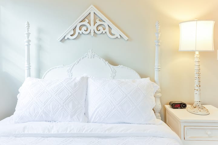 Nice painted  full sized poster bed in the 4th bedroom.