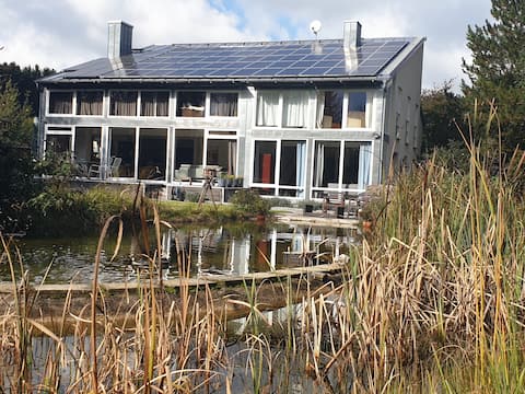 House nearby Munich with garden, pond and alpsview