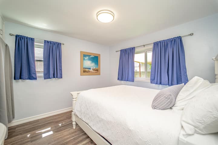 2nd BR: Queen bed with blackout curtains. Closet contains pack n play.