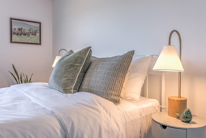 Black Butte bedroom- Come check out some of our ranch history on the walls!  Queen bed, closet, and separate TV.