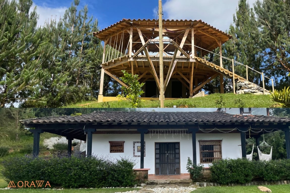 The image displays two distinct cabins: the upper structure features a wooden frame and open staircase amid greenery, while the lower cabin showcases a traditional design with white walls, a tiled roof, and a flowering garden, inviting natural light through its windows.