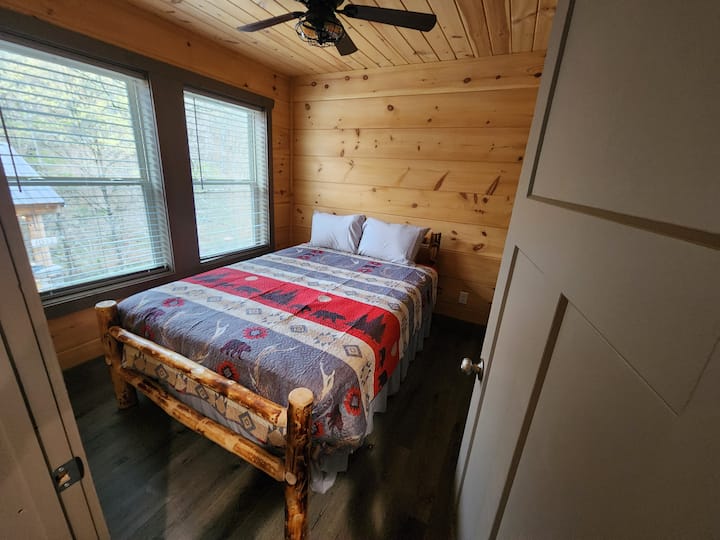 Upstairs Bedroom 3 has a queen bed and a spacious closet.