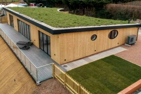 Riverside Eco-Bungalow. Tranquil setting & views.