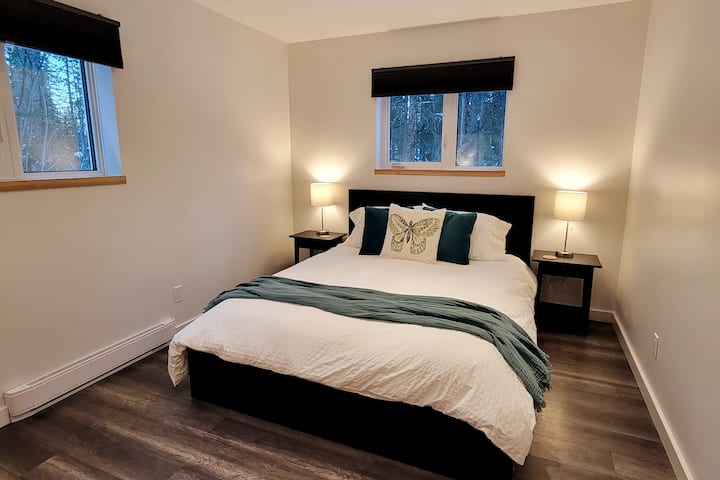 Bedroom Two on ground floor- Fluffy down duvet and high quality cotton sheets on a Queen bed.  