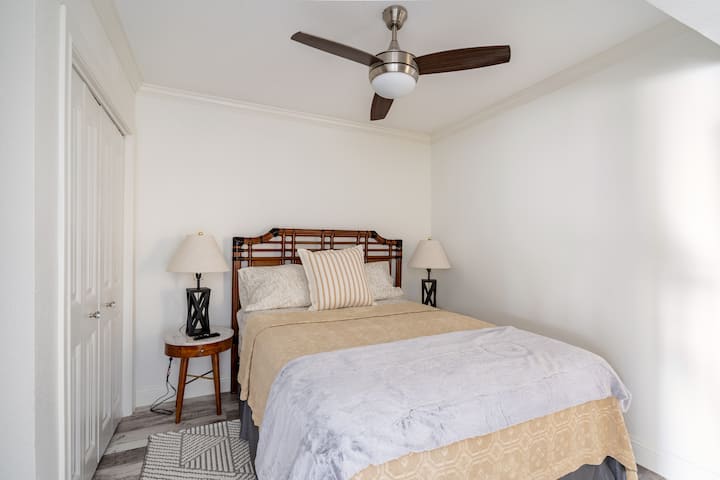 Bedroom 2 (queen bed with closet and TV)