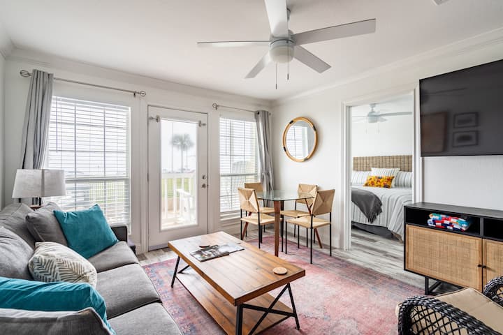 Living and dining area with ocean-front view
