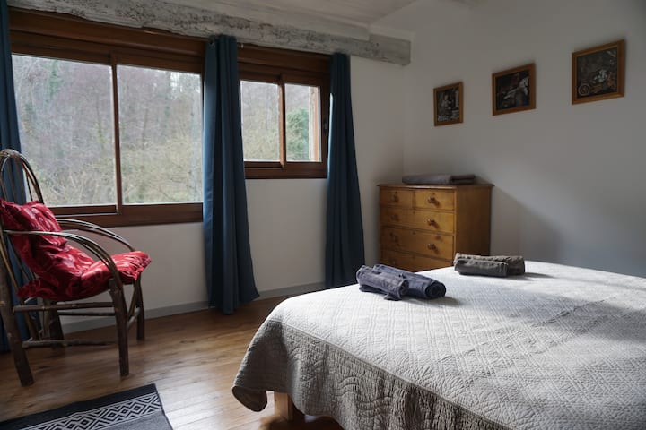 master bedroom - 160cm bed . picture windows with view over your garden and valley