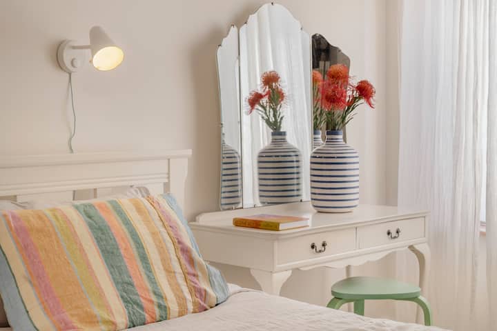 Bedroom 2 has its own dressing table - because holidays should feel a little glamorous. 