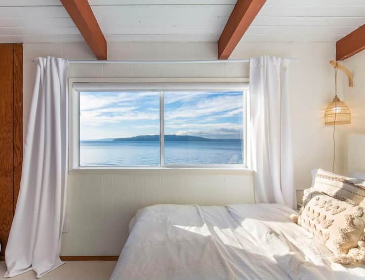 Our Eagle’s Nest 3rd Room/Office is outfitted with a breathtaking view that encompasses almost an entire wall of the room, a full size memory foam bed, and 4 usb bedside charging ports.