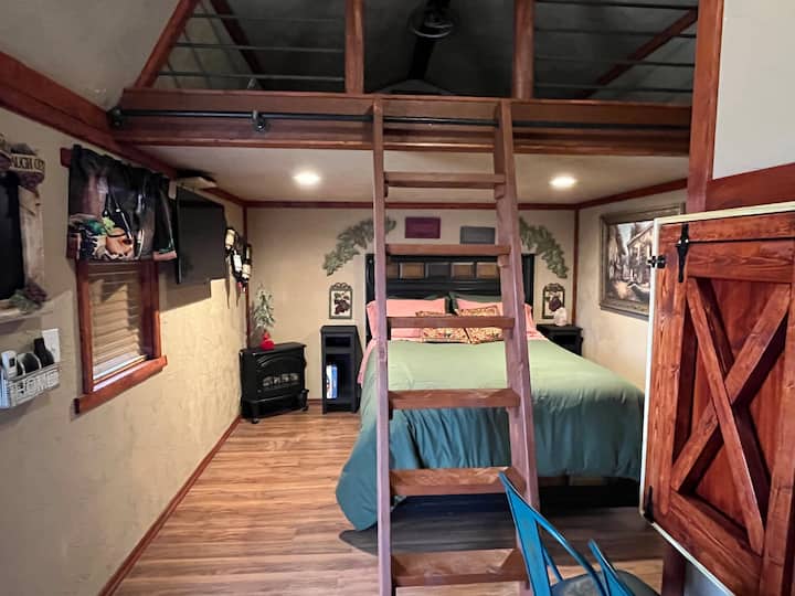 Queen comfy bed with moveable ladder to get in loft.  Swing out smart tv.