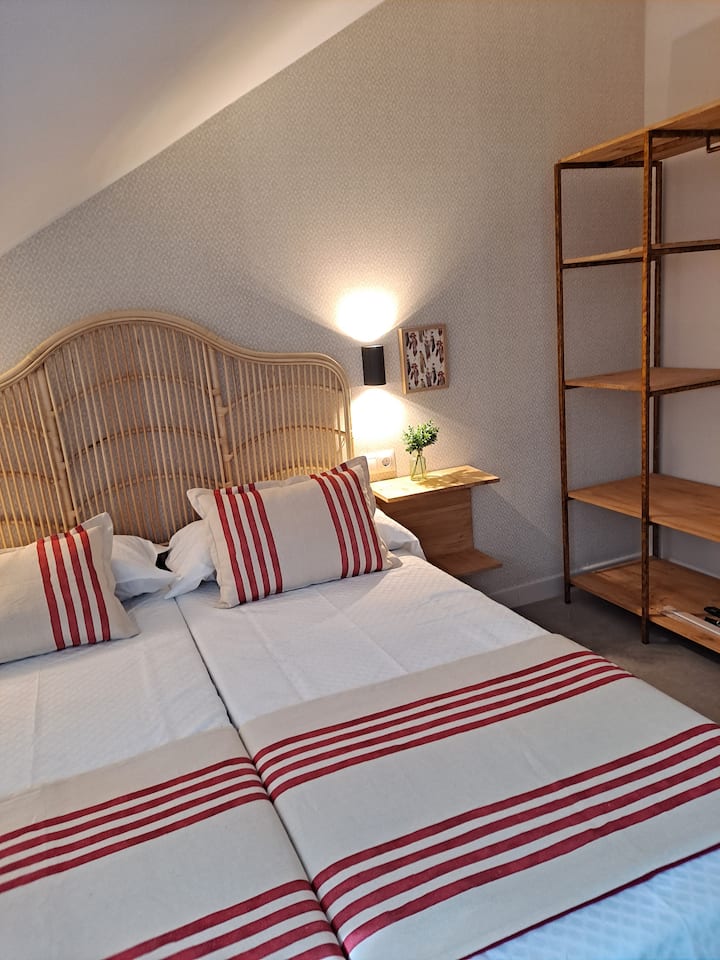 Bedroom with dome ceiling. Balls and hangers-organizer clothes