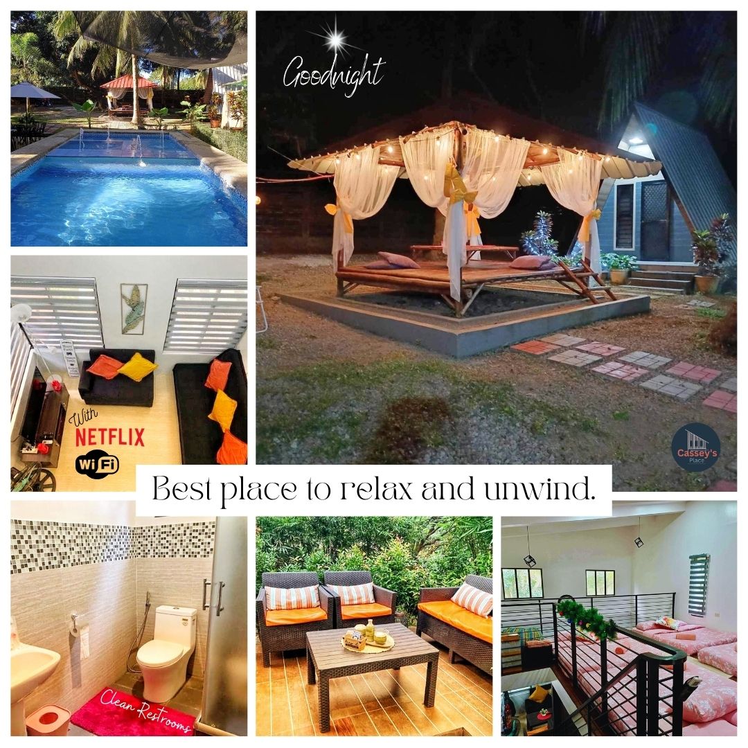 An outdoor pavilion adorned with soft drapery provides a serene seating area surrounded by landscaped grounds. Nearby, a tranquil swimming pool reflects the surrounding palm trees under evening lighting. Cozy seating arrangements are visible within the main house, alongside a neatly maintained bathroom and loft with wooden railing.