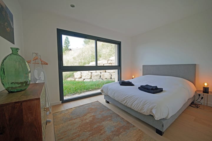 Bedroom 2  of Loft Takapuna with lake and mountain views. 