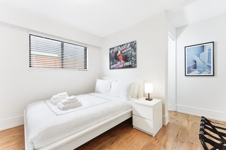 "Unwind in Comfort in Our Double Bedroom with 40-inch TV, Beautiful Artwork, Convenient USB Charging and Plug-In Touch Lamps, and a Luggage Rack for Easy Organization. Enjoy Your Stay with Our Thoughtful Touches and Quality Amenities."