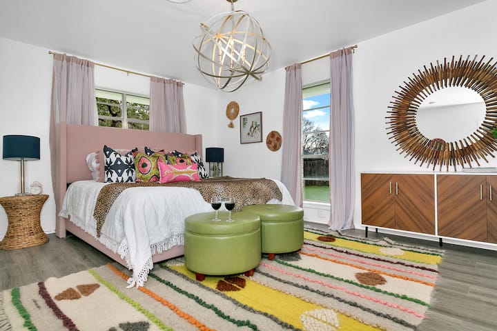Relax and unwind in our king-sized bedroom, complete with plush bedding, comfortable bed, and pillows that will ensure a peaceful night's sleep. 