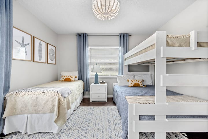 2nd bedroom with 2 twins and a full bed