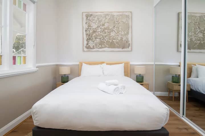The immaculately presented first bedroom has a premium queen-sized bed and has a mirrored built-in wardrobe with plenty of space for your belongings.