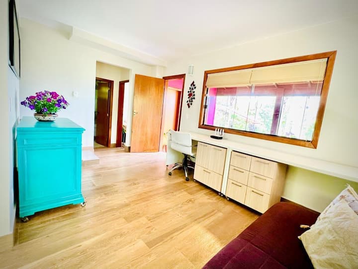 Living room with Office Furniture and 1 Sofa Bed