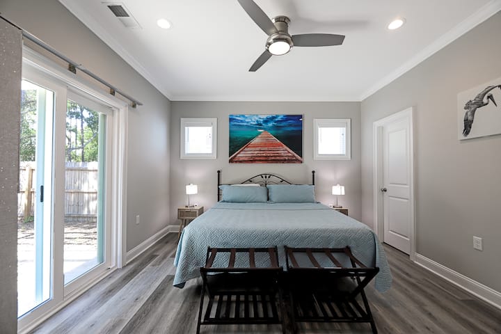 Primary bedroom on the main level with a King size bed.
