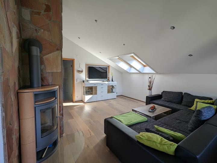Modern attic apartment with balcony