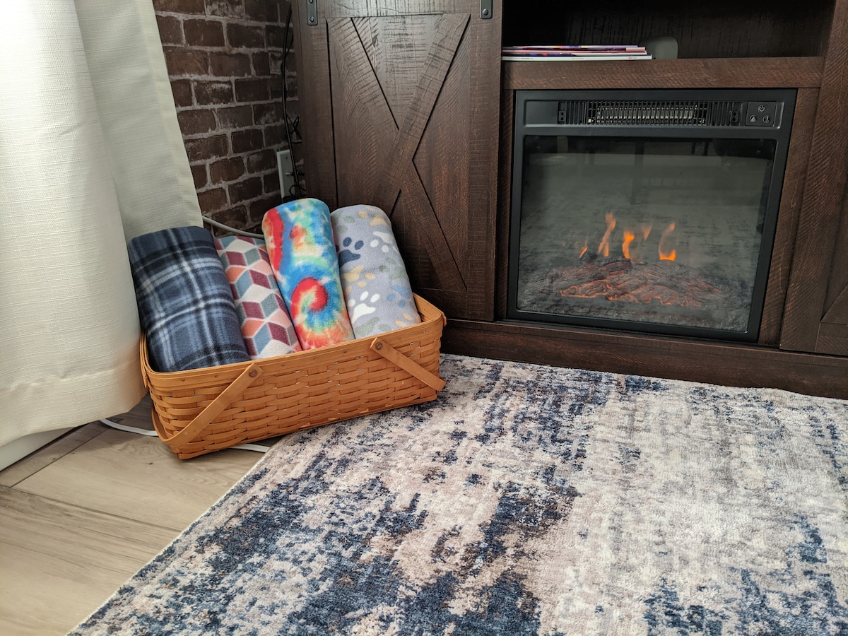 Plenty of throw blankets to get cozy while watching tv